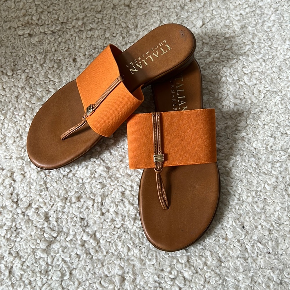 Orange women’s sandals, size 7